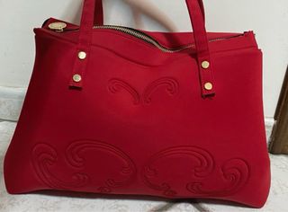 Borsa La fille des Fleurs rossa con dettagli oro