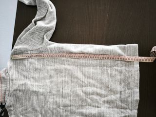 Polar Quechua gris con cremallera y detalles rosa