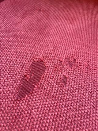 Sillón de tela rojo