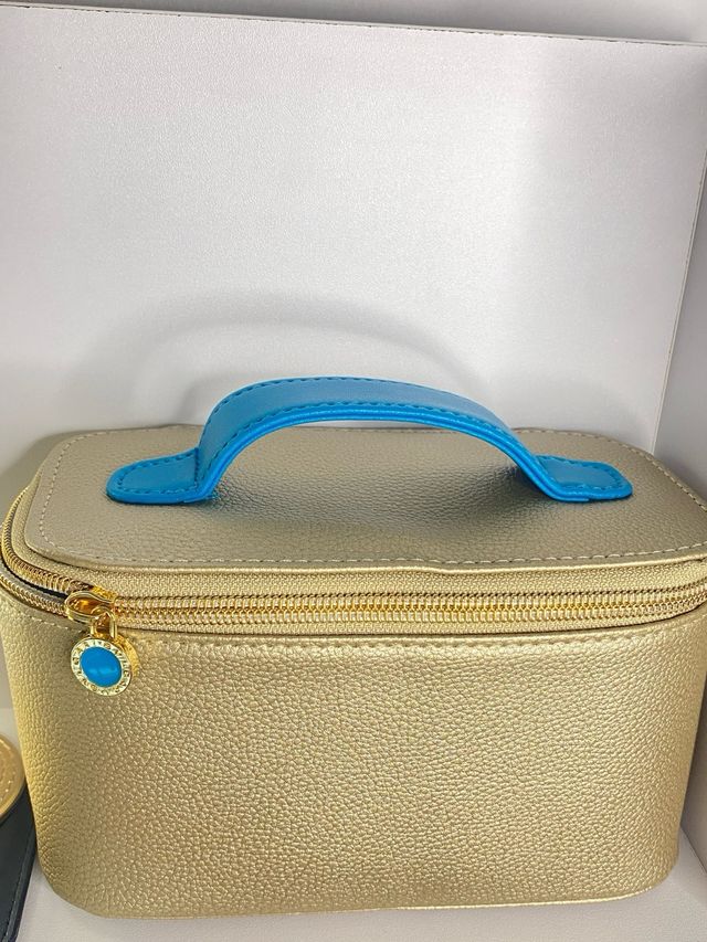 Neceser y espejo Bvlgari dorado y turquesa