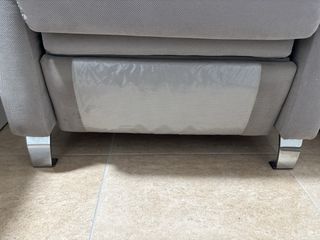 Sillón reclinable de tela gris