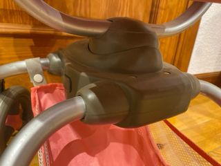 Carrito de muñecas rosa