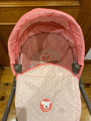 Carrito de muñecas rosa