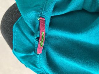 Camiseta sin mangas con volantes verde azulado