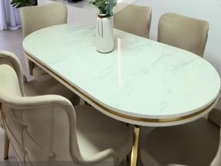 Mesa de comedor moderna mármol negro y oro