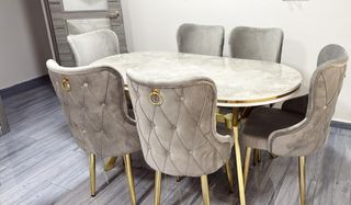 Mesa de comedor moderna mármol negro y oro