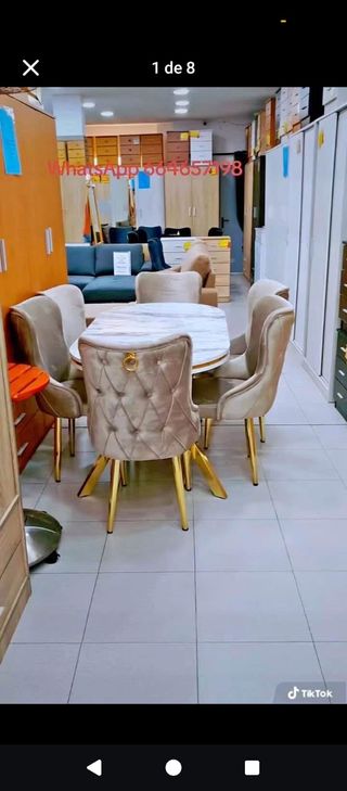 Mesa de comedor moderna mármol negro y oro