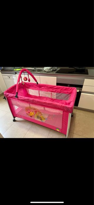 Cuna de viaje rosa