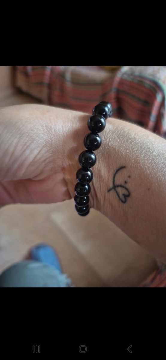 Pulsera Tous elástica negra con oso