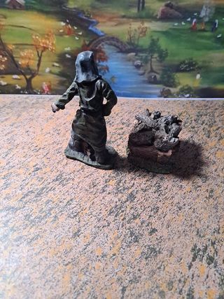 Figura de comerciante con carro de leña 