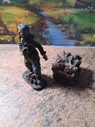 Figura de comerciante con carro de leña 