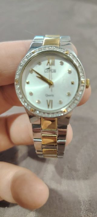 Reloj Lotus Oro y Plata