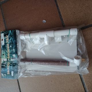Percha para ducha de loros