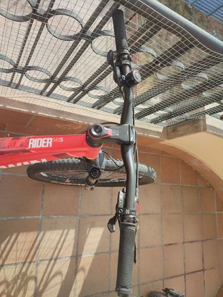 Bicicleta Btwin Rockrider Roja con doble suspensió