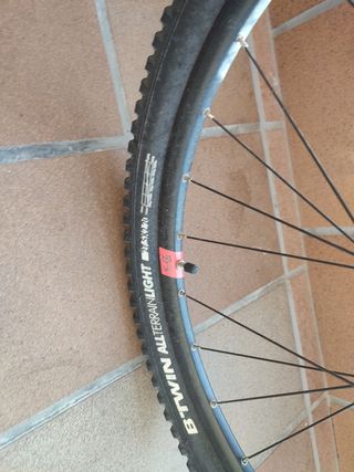 Bicicleta Btwin Rockrider Roja con doble suspensió