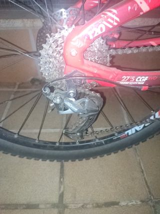 Bicicleta Btwin Rockrider Roja con doble suspensió