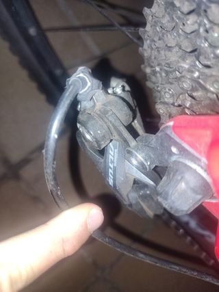 Bicicleta Btwin Rockrider Roja con doble suspensió