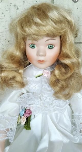 Coppia di bambole in porcellana