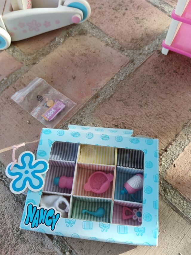 Nancy y bebé en carrito de la compra