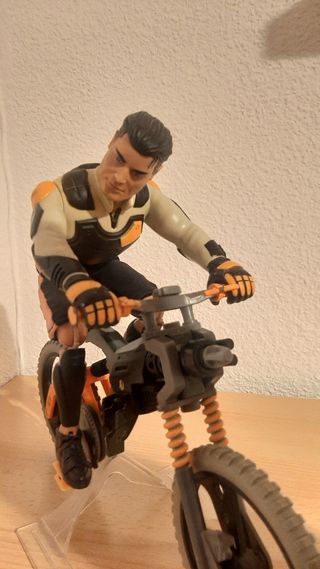 Muñeco Action Man con Bicicleta