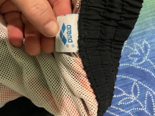 Pantaloncini Arena uomo nero, rosso, bianco