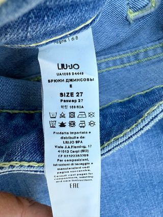 Jeans in cotone elasticizzato, con risvolto