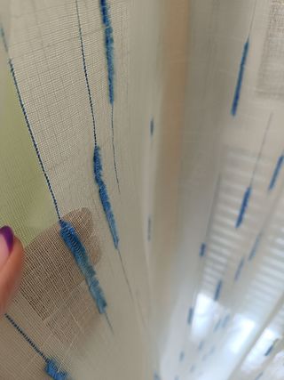 Cortinas de hilo azul y blanco