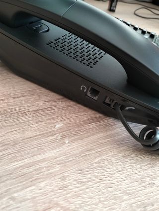Teléfono fijo Alcatel y adaptador