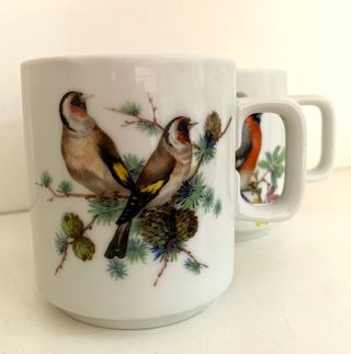Par de tazas vintage de porcelana con pájaros