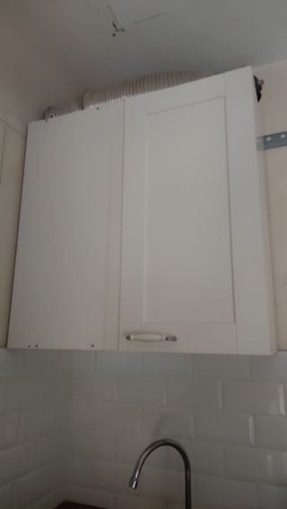 Mueble esquinero de cocina blanco de madera