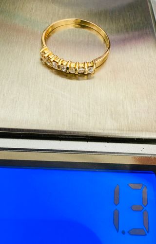 Anillo Oro 18k con 7 Diamantes