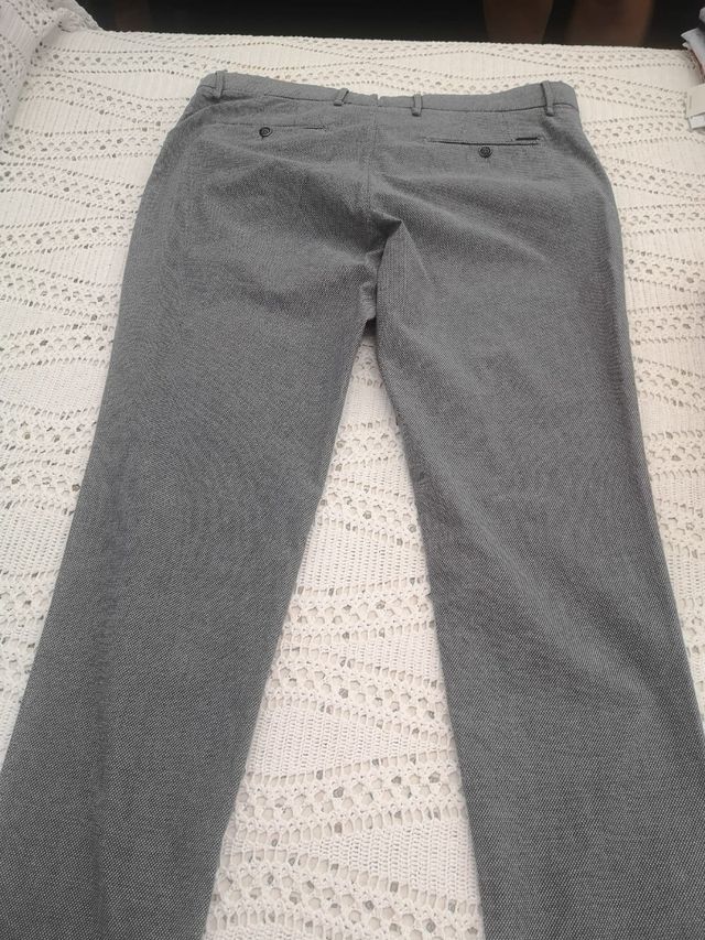 Pantalón azul grisáceo solo un uso de la talla 48