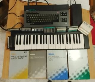 Ordenador Yamaha CX5M MSX con accesorios