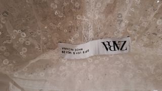 Top blanco lentejuelas manga corta