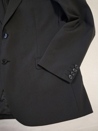 Traje Puro Ego Chaqueta y Pantalón gris oscuro .