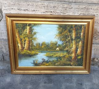 Quadro con cornice dorata