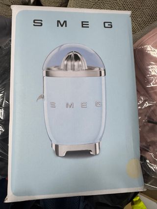 Spremiagrumi Smeg blu e argento