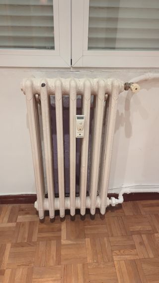 Tres Radiadores de hierro fundido blancos