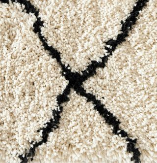 Alfombra mullida pelo largo beige y negro
