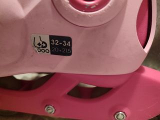 Patines rosas  32-34 Oxelo, casco y protecciónes 