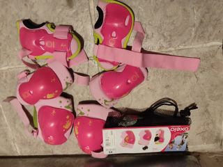 Patines rosas  32-34 Oxelo, casco y protecciónes 