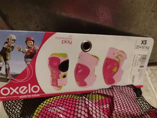 Patines rosas  32-34 Oxelo, casco y protecciónes 