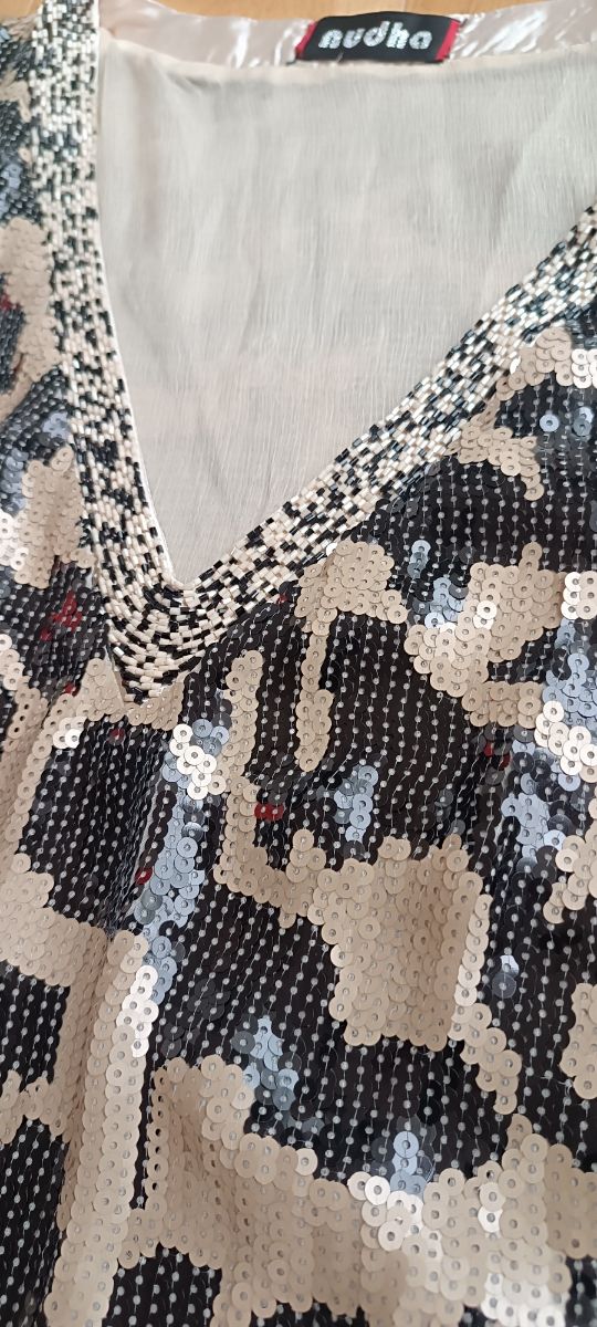 Jersey largo lentejuelas animal print, fiesta