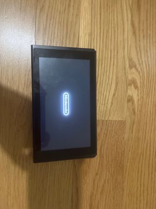 Nintendo Switch + cargador + 128GB