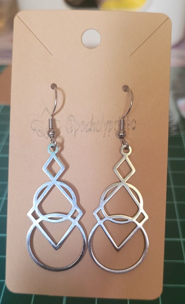 Pendientes largos geométricos redondos plateados