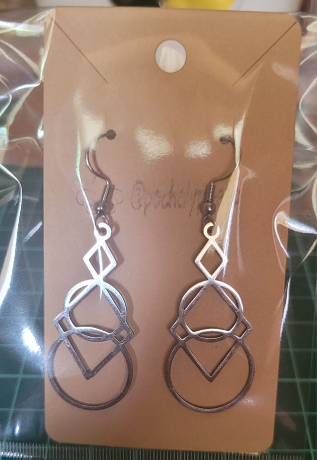 Pendientes largos geométricos redondos plateados