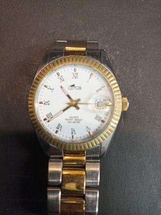 Reloj Lotus Dorado y Plateado