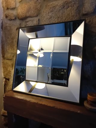 Specchio vintage con cornice nera e argento