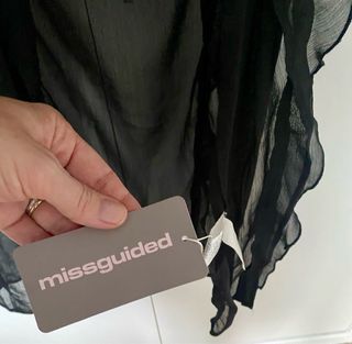 Casaca negra transparencias manga larga sin estren