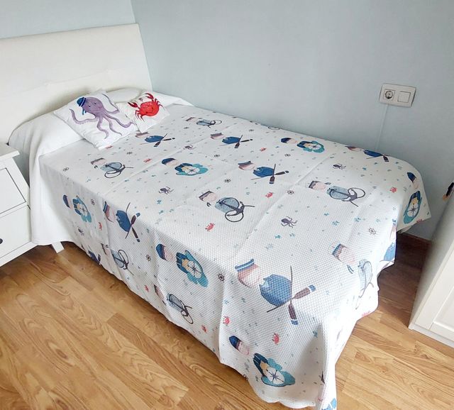 Colcha infantil con dibujos marinos